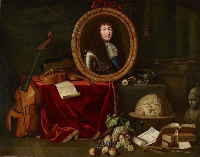 A portrait of Louis XIV in a gilded oval frame, set among musical instruments, books, a globe and a bust of Minerva