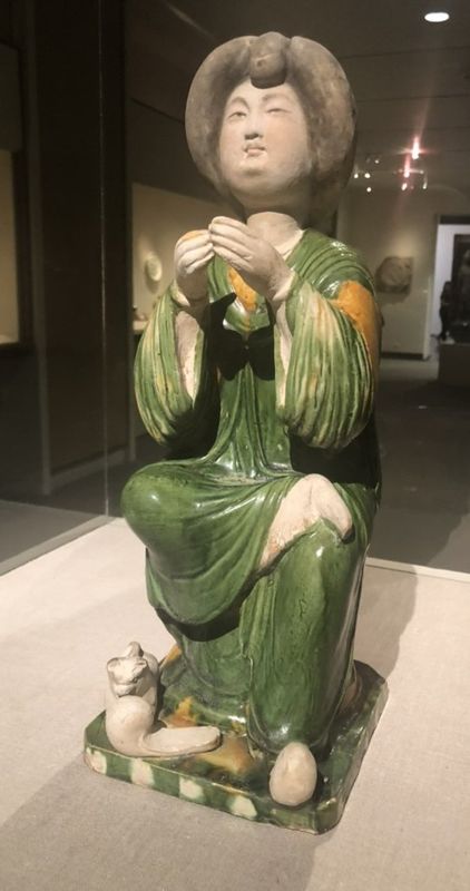Figure of a Seated Court Lady. Tang dynasty (618–907), 8th century. Earthenware with tricolor (sancai) glaze.
